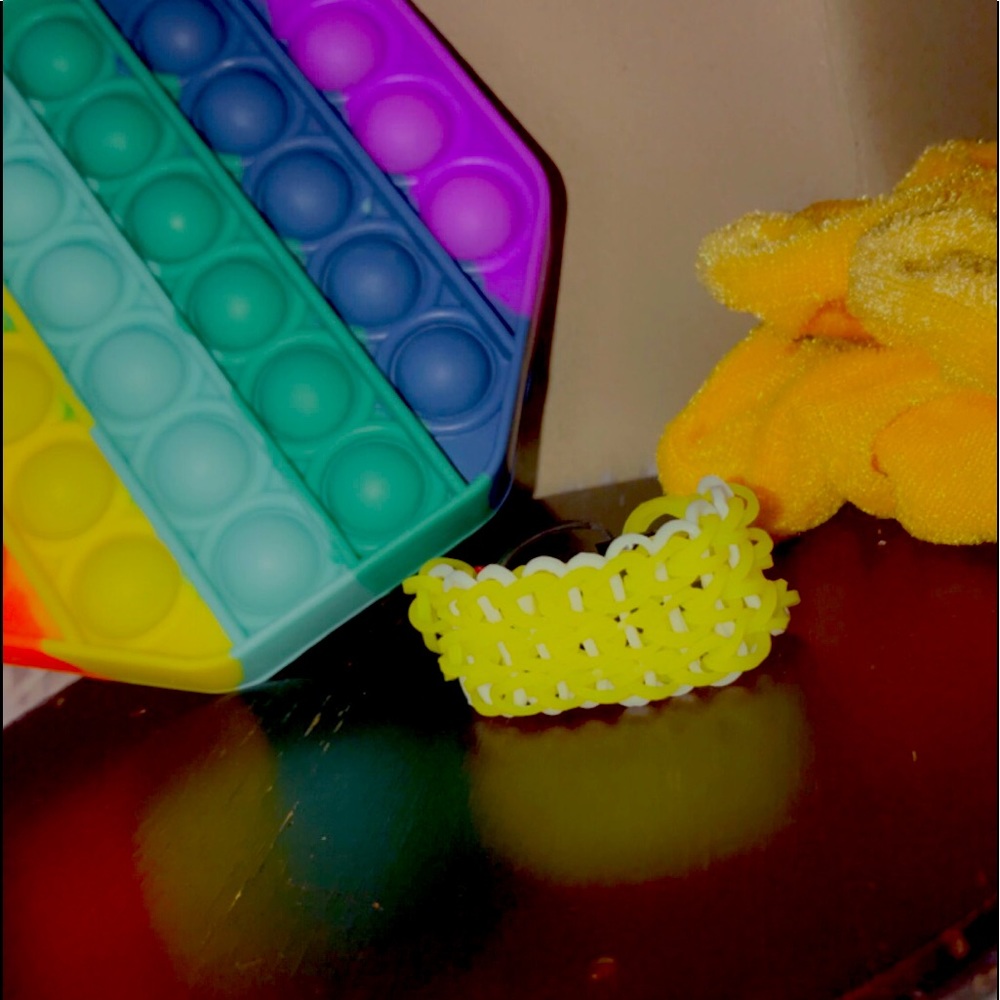 Yellow and white rainbow loom bracelet